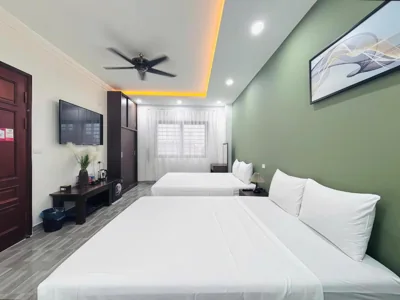 King-Zimmer mit zwei Kingsize-Betten — Moon Hotel Apt 3 Pham Tuan Tai